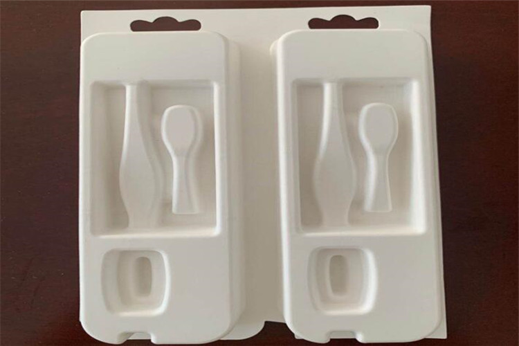 molded pulp tray for toothbrush pack